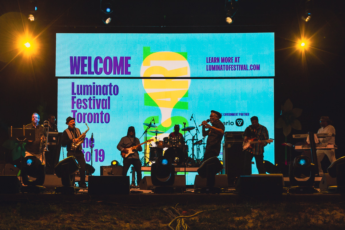 Black reggae artist Horace Andy performs on an outdoor stage at Luminato Festival. © Andy Lee, 2022. realandylee.com