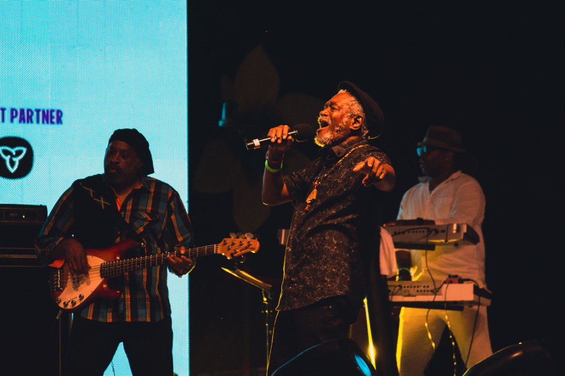 Black reggae artist Horace Andy performs on an outdoor stage at Luminato Festival. © Andy Lee, 2022. realandylee.com