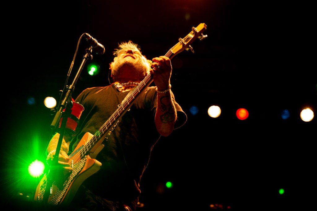 Fat Mike playing bass onstage