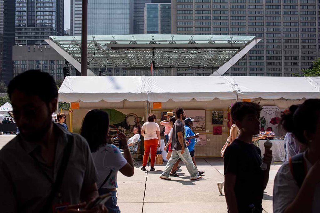 Patrons browsing the 2025 Toronto Outdoor Art Fair